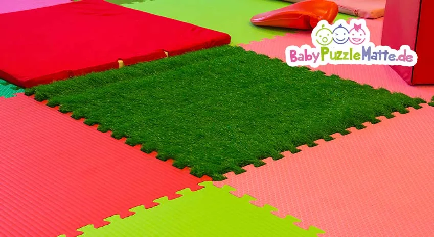 Puzzlematte Ökotest mit einem grünen Gras Feld in der Puzzlematte